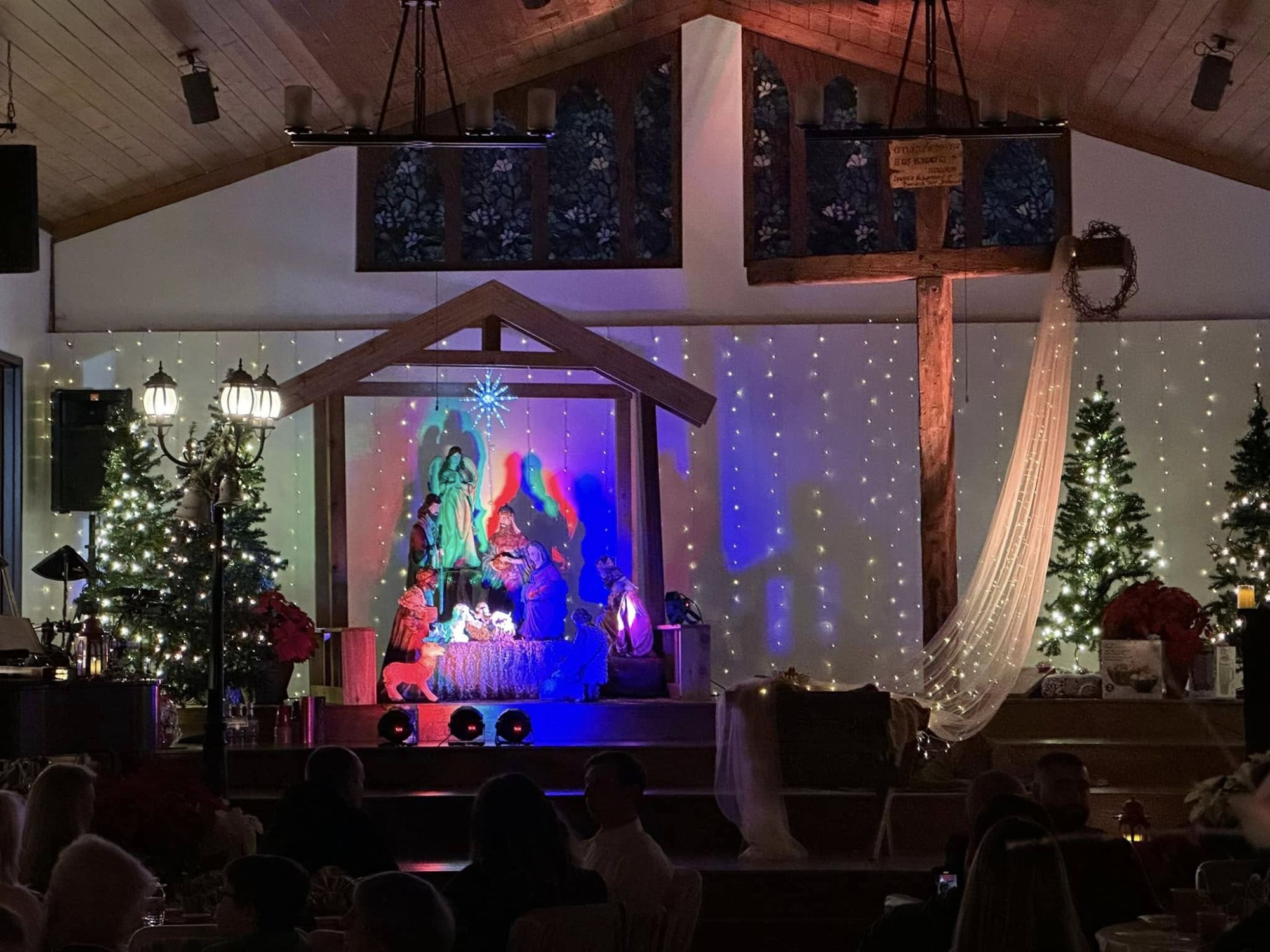 Nativity scene lit up on stage